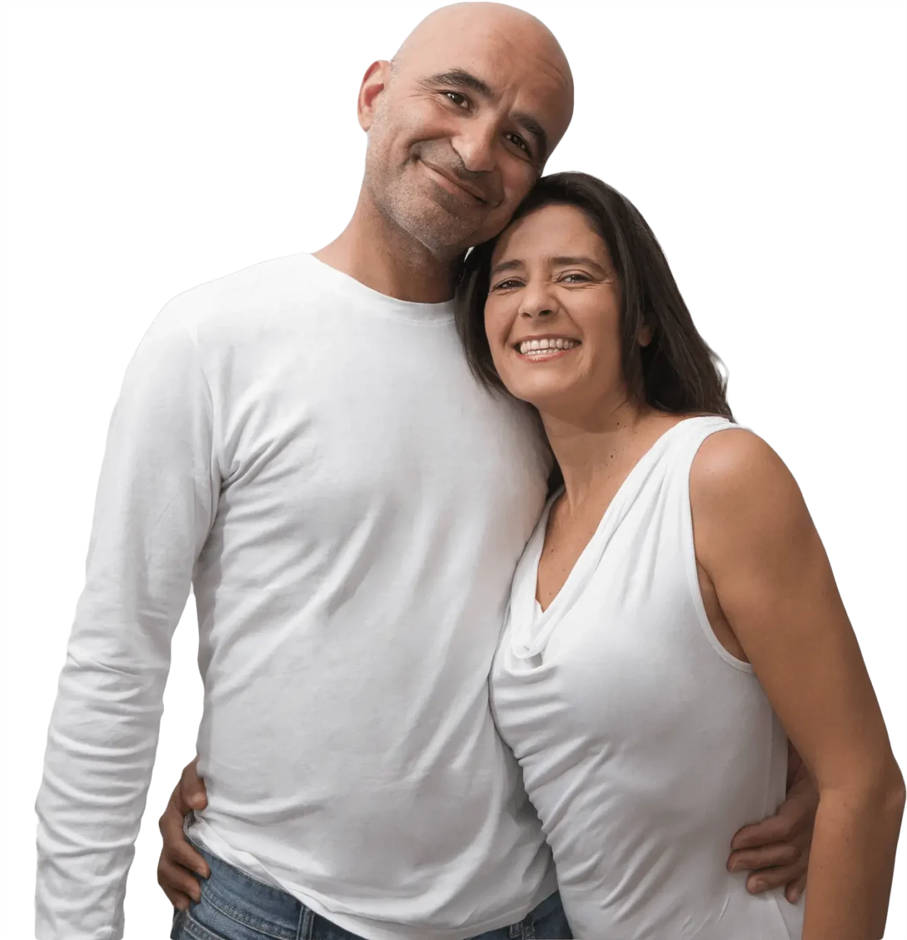 Attractive middle-aged Spanish couple showing love and happiness hugging.
